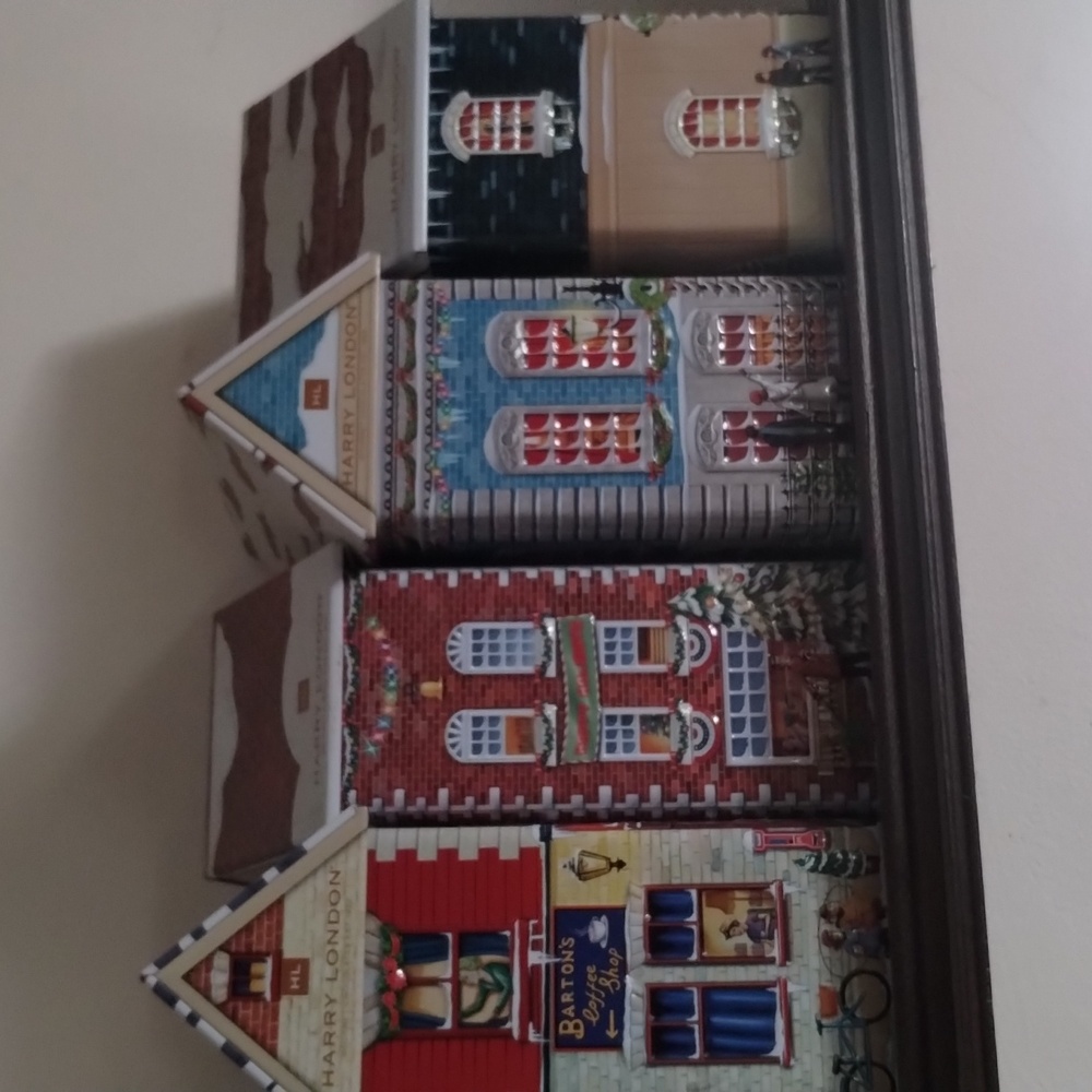 Collectible Seasonally Decorated Cookie Tin Houses